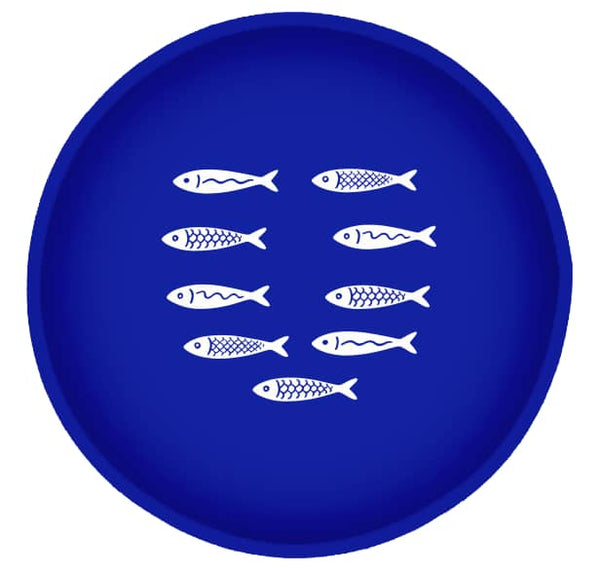 Blue plate with white fish illustrations on a white background